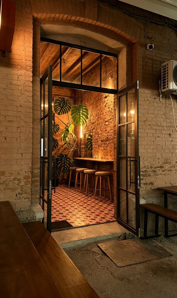 A glazed brick archway leading into the building